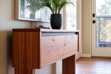 Marri Hall Table with distinctive timber grain in an entryway